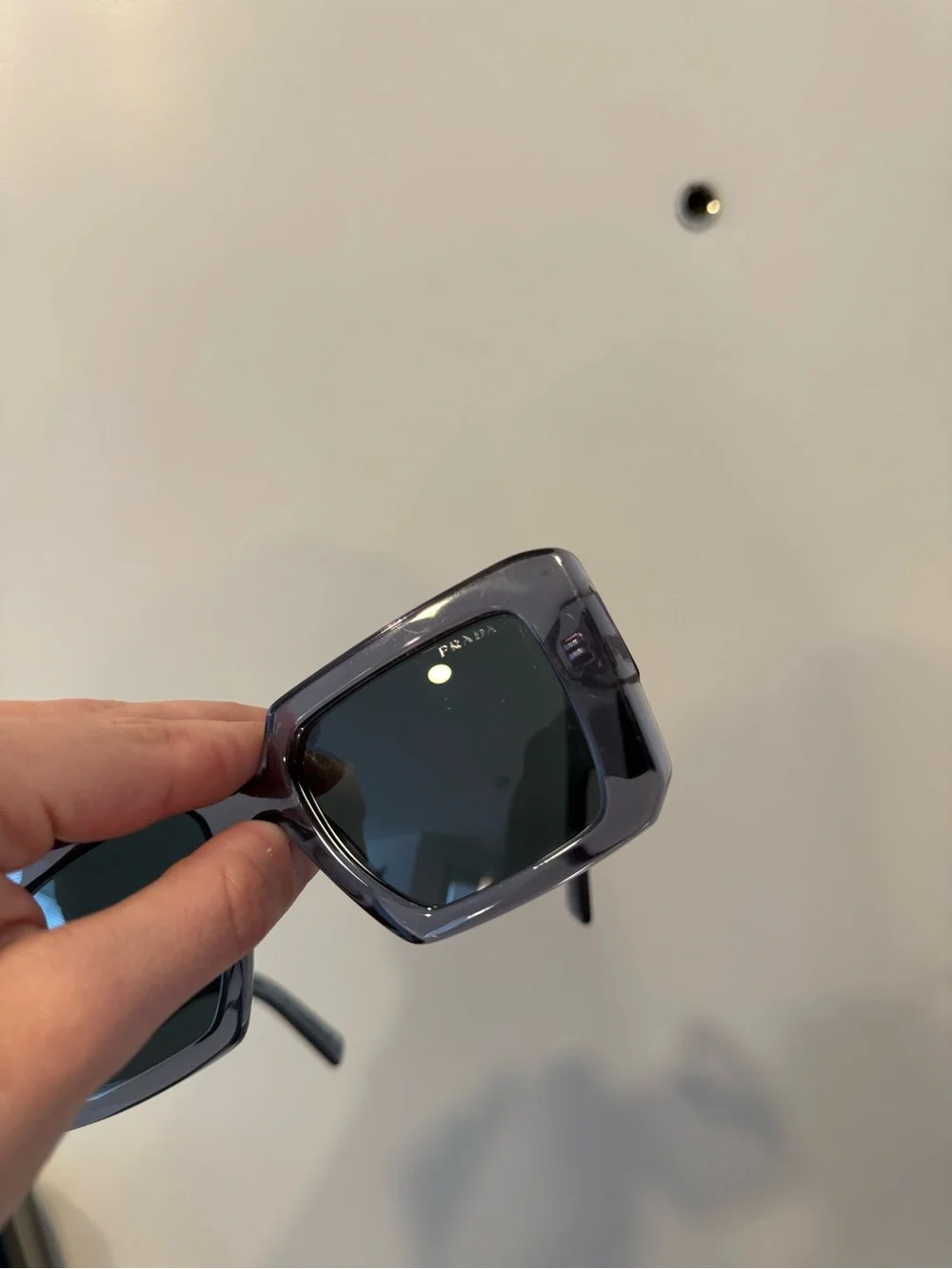 Prada Women’s Square Sunglasses in Translucent Gray with Dark Lenses